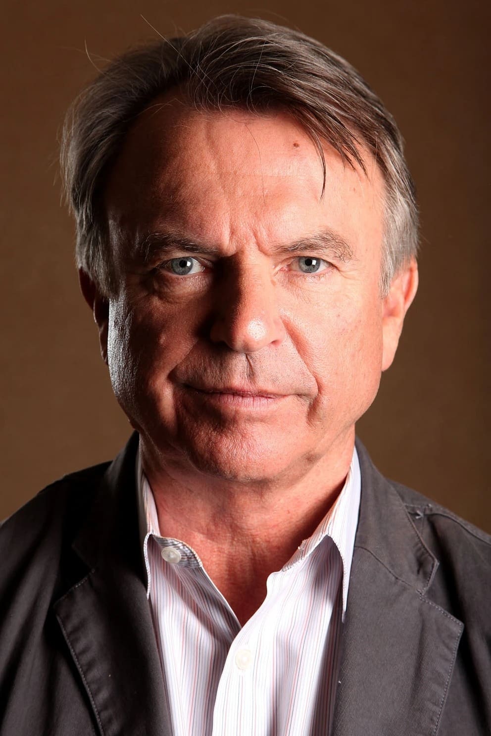 Sam Neill → Sam Nil backdrop