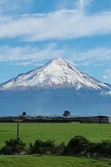 Te Kāhui Tupua Taranaki Mounga backdrop