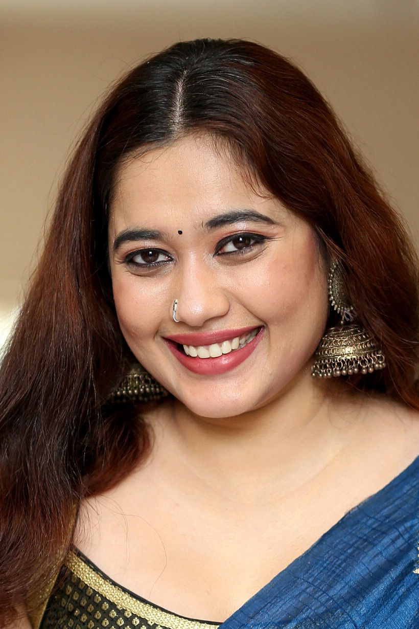 Ankitha Karath backdrop