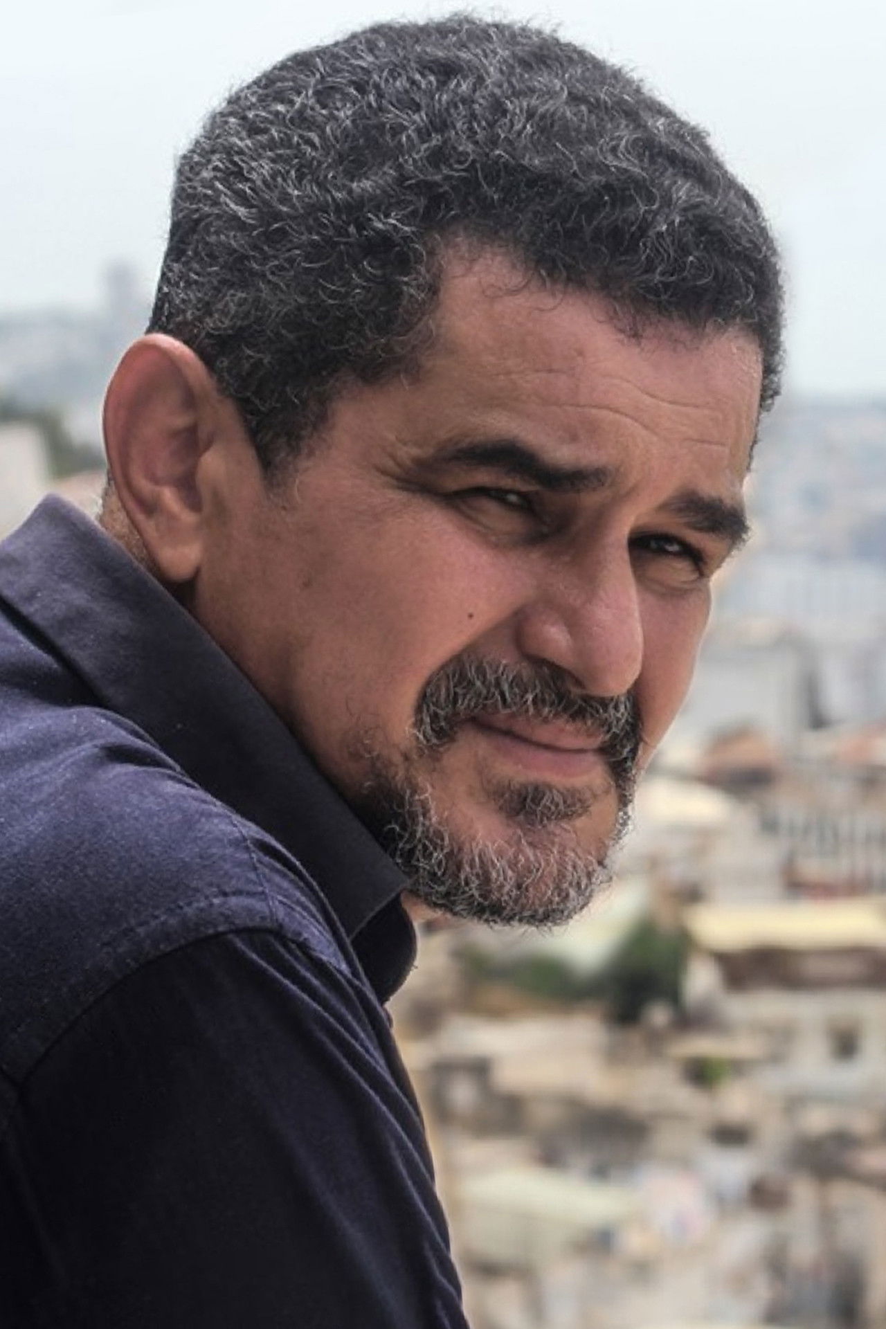 Mahdi Berrached backdrop