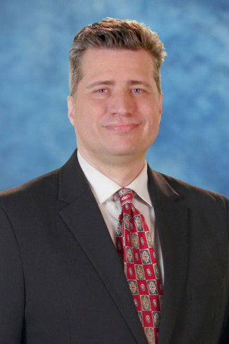 Kenneth J. Coughlan backdrop