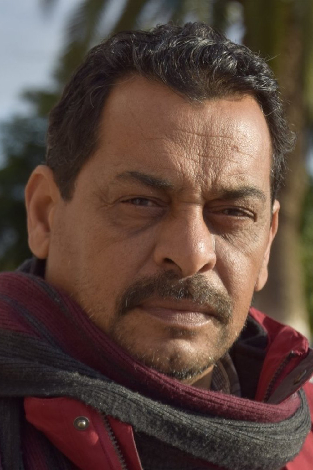 Laaroussi Hannachi backdrop