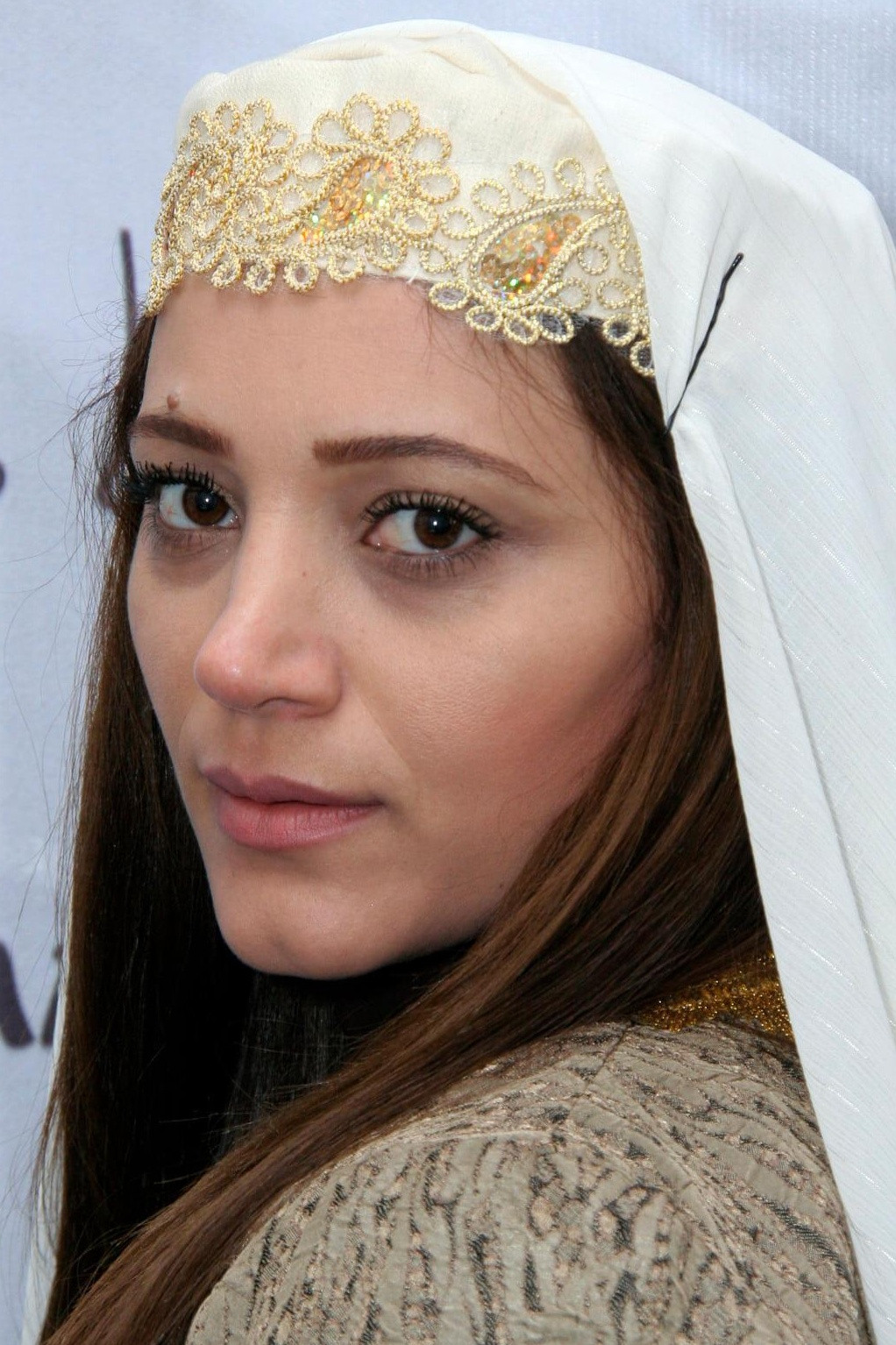 Xuraman Əliyeva backdrop