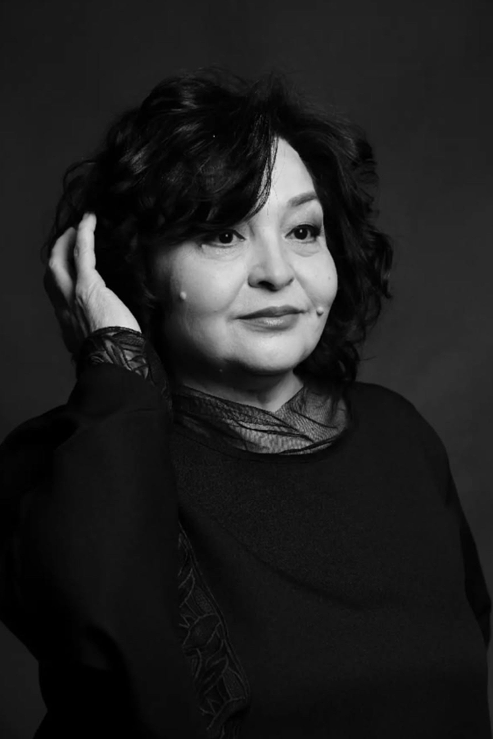 Raikhan Kalioldina backdrop