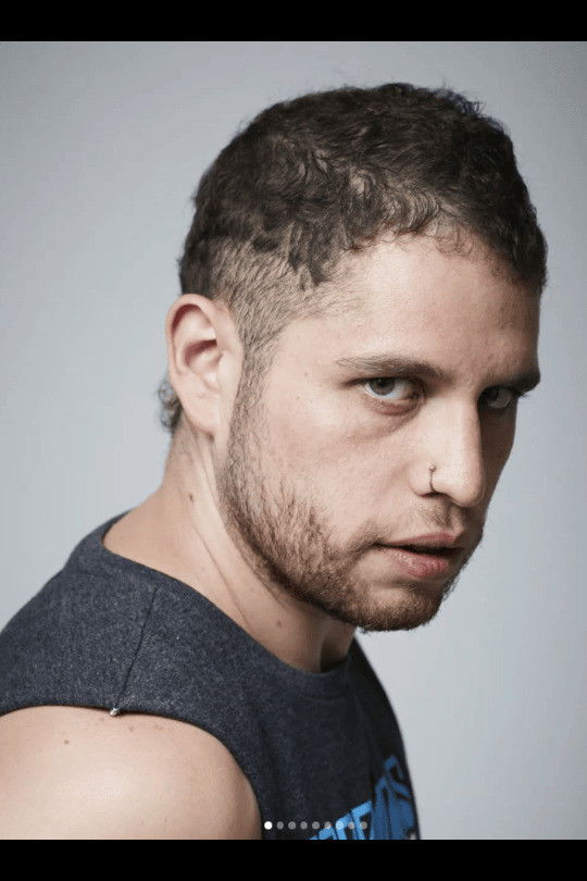 Luis Guzmán backdrop