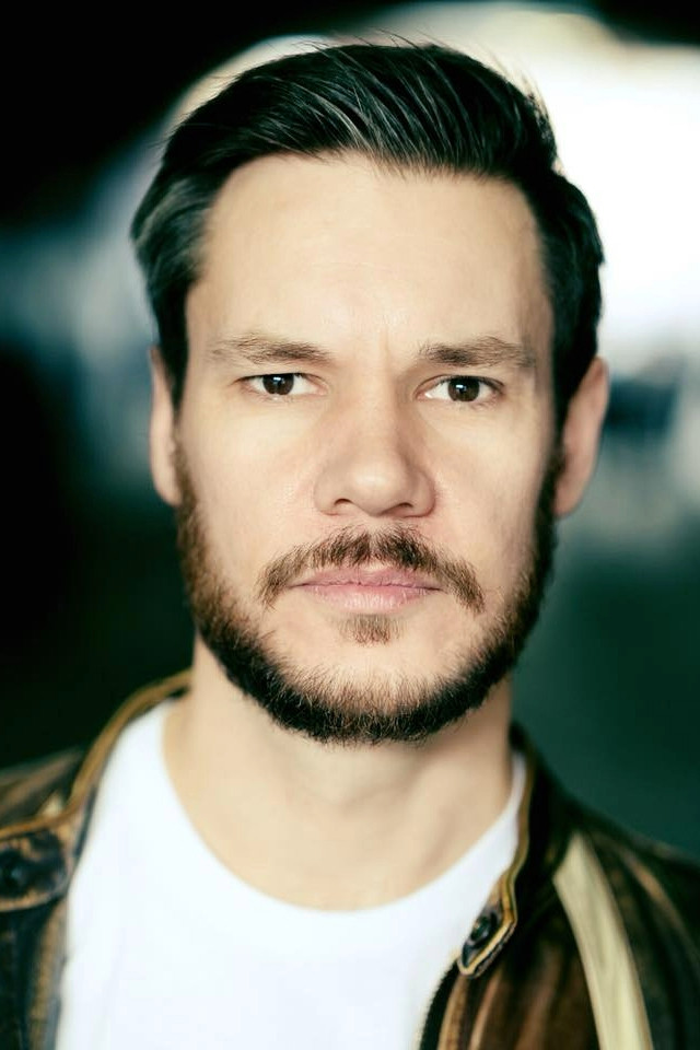 Jonathan Scholey backdrop