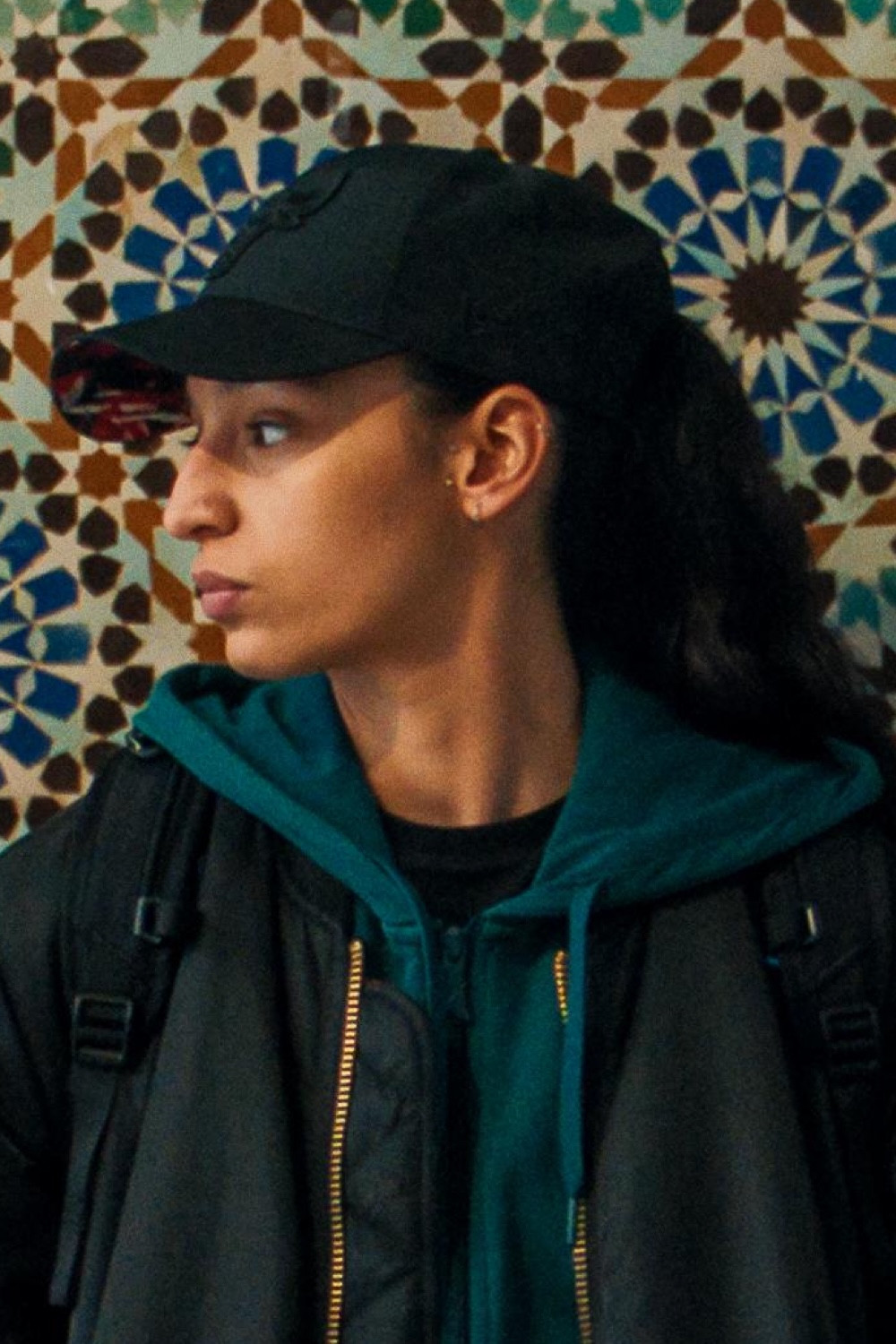 Nadia Melliti backdrop