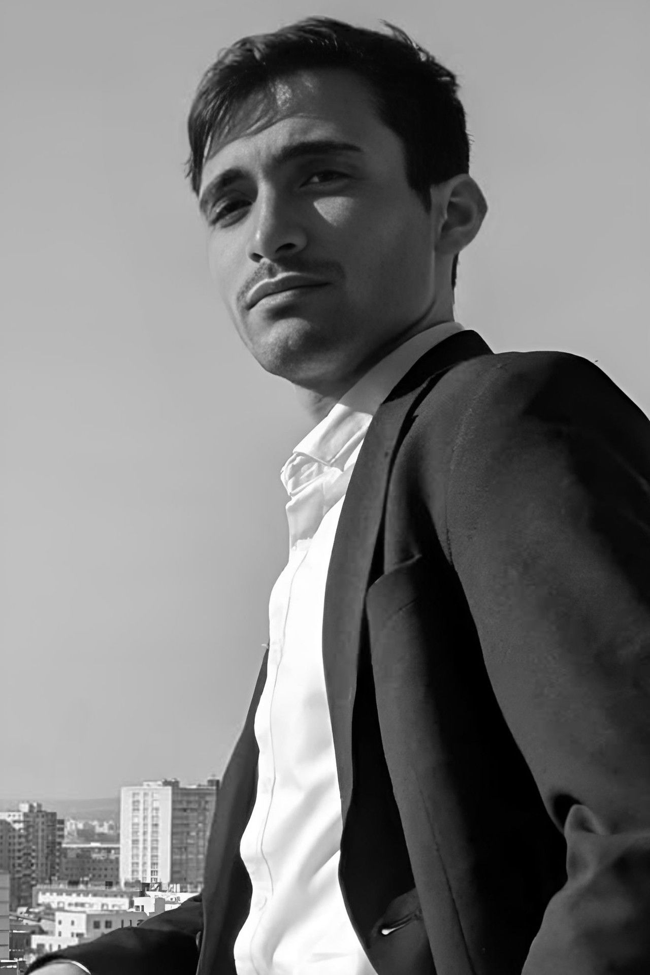 Mohamed Gholam backdrop