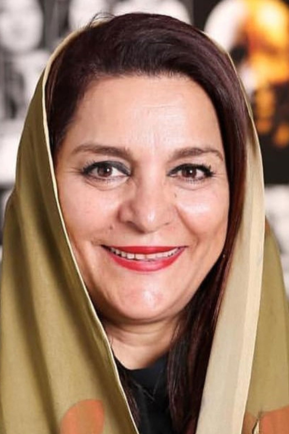 Tahmine Milani backdrop