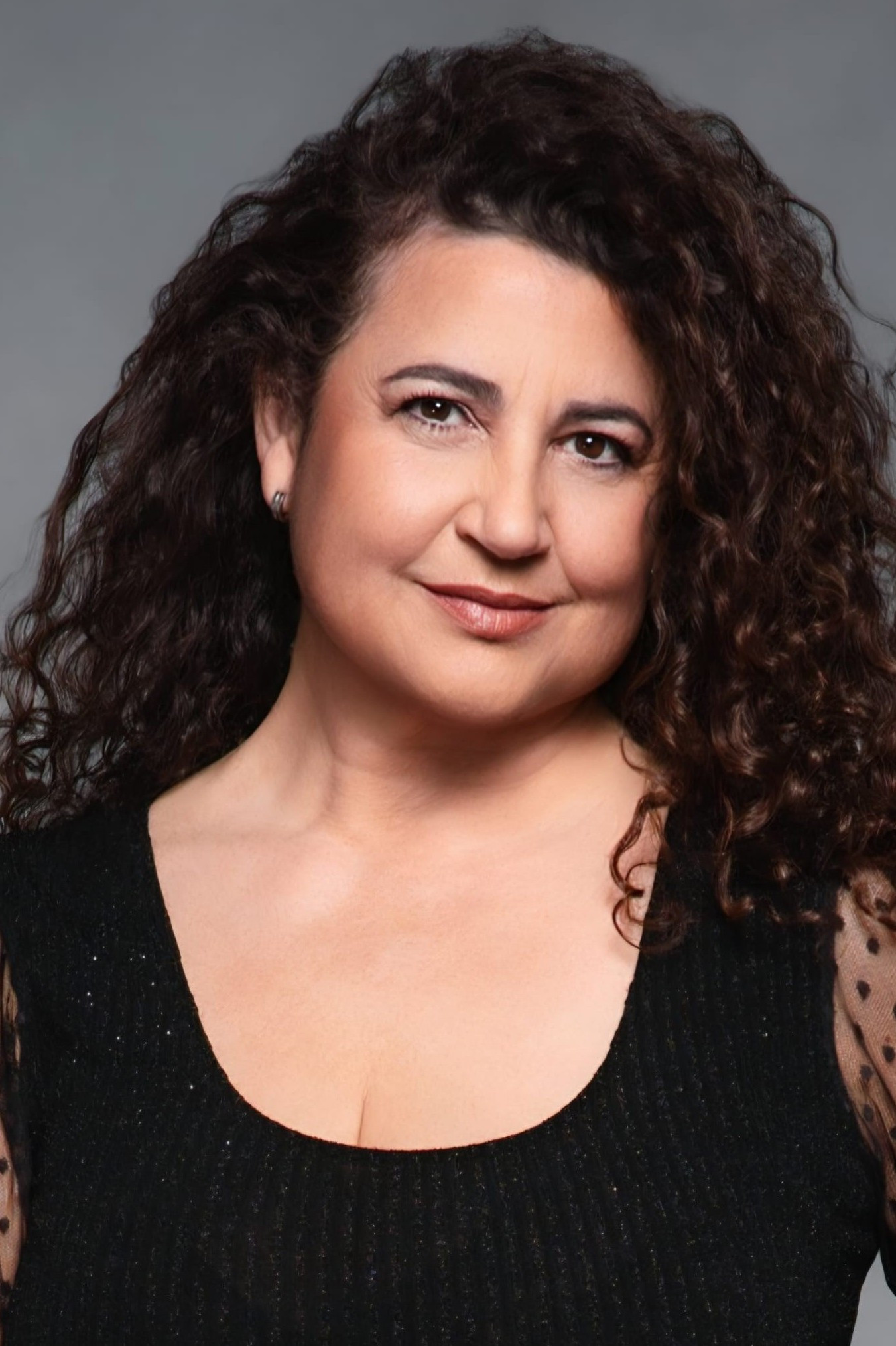 Amparo Calzada backdrop