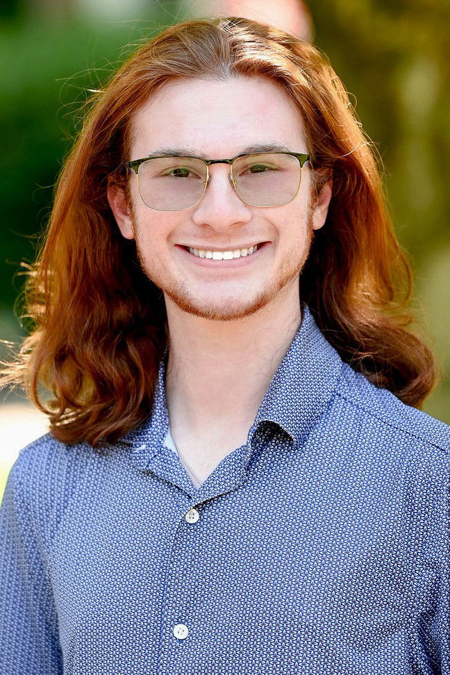 Logan G. Daitch backdrop