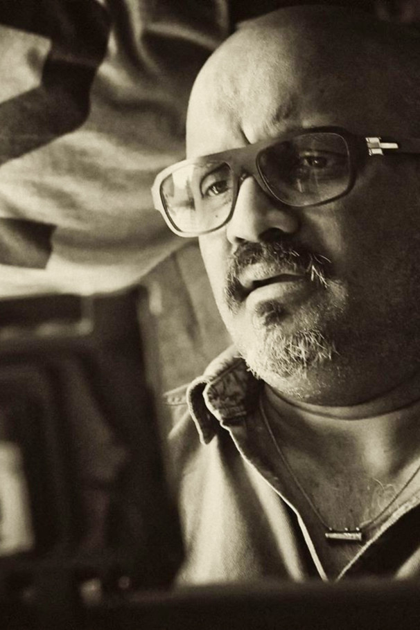 Ravi K. Chandran backdrop