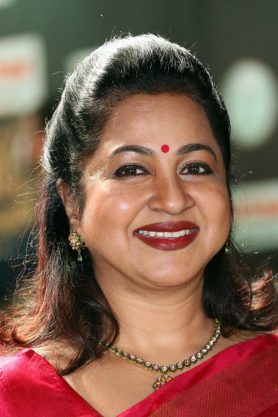 Radikaa Sarathkumar backdrop
