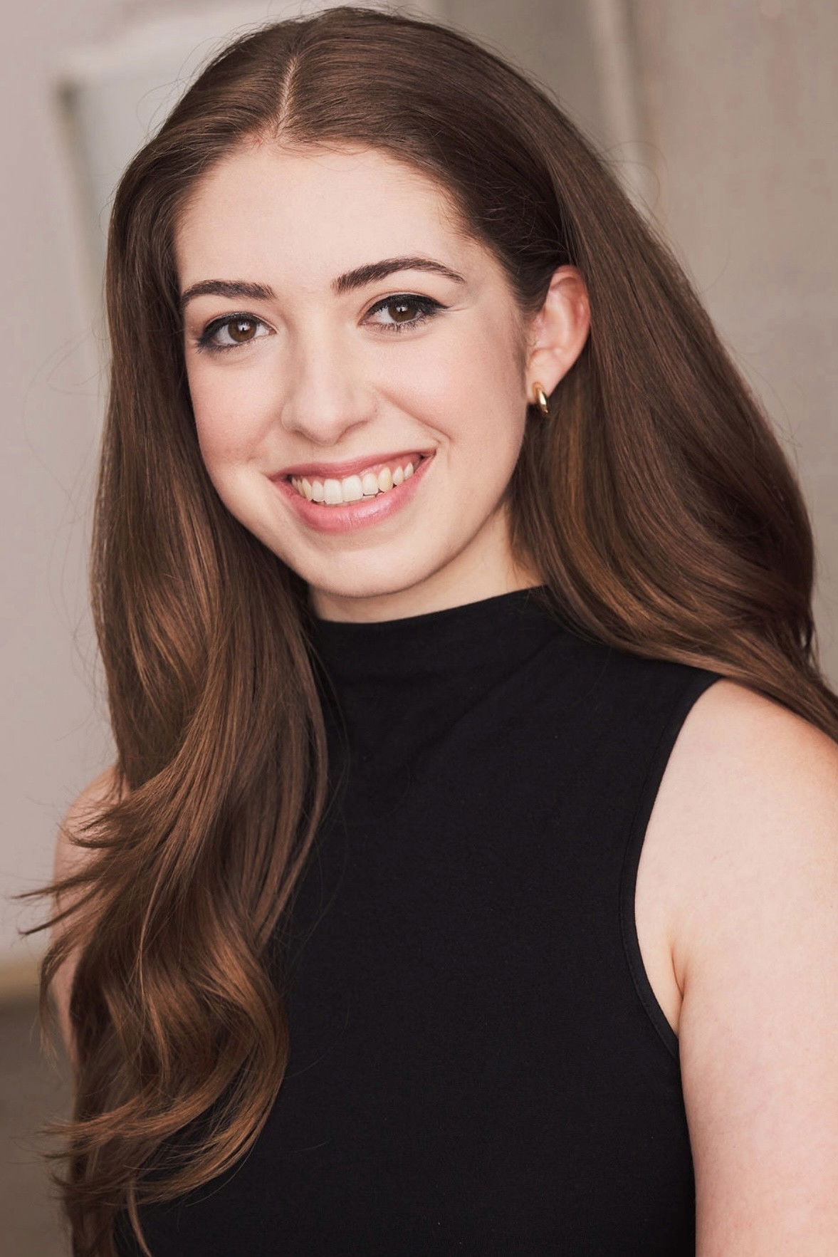 Kelly Bouslaiby backdrop