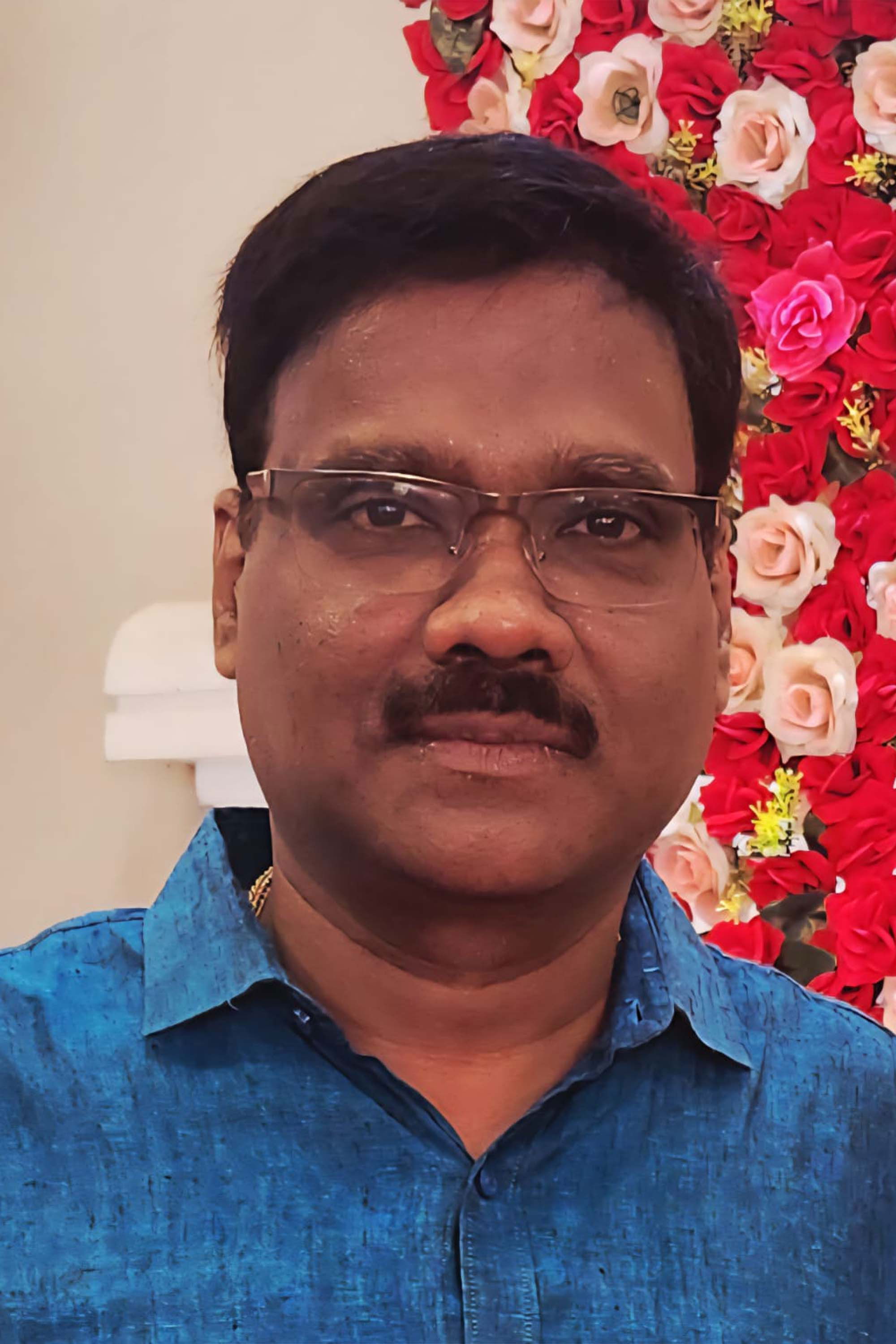 R.M. Rajesh backdrop