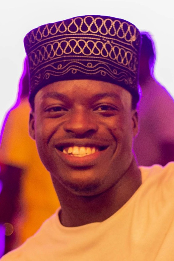 Enumah Oliseh backdrop