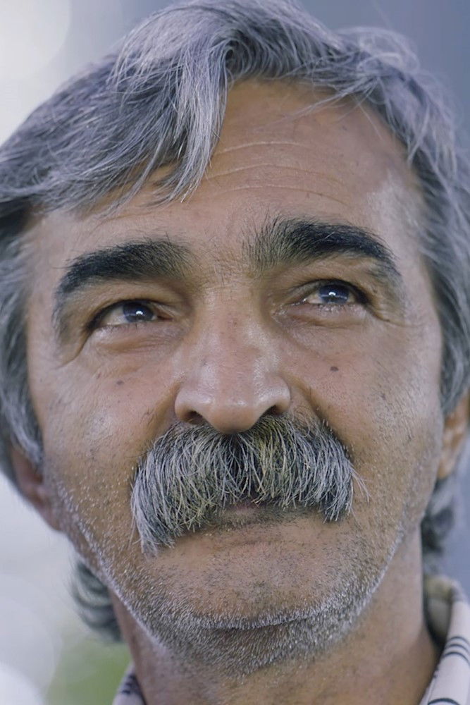 Gholamreza Ghassemi backdrop