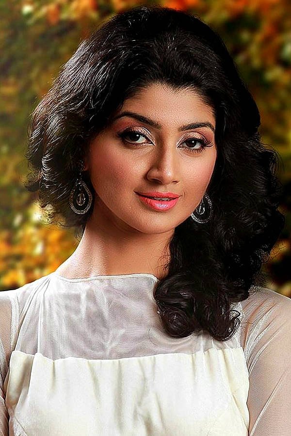 Divyaa Unni backdrop