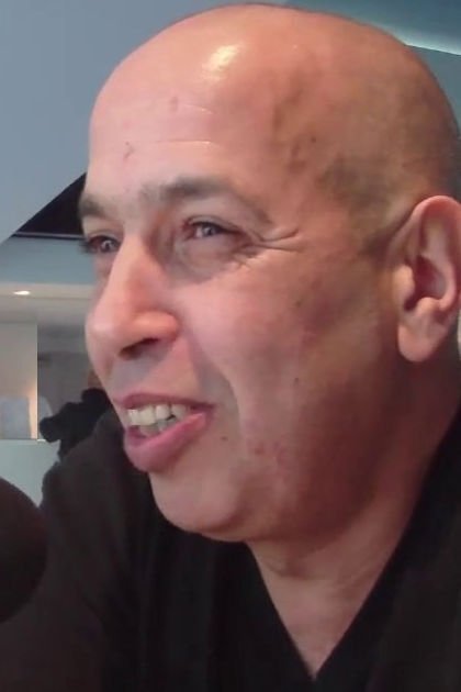 Mohamed Metina backdrop