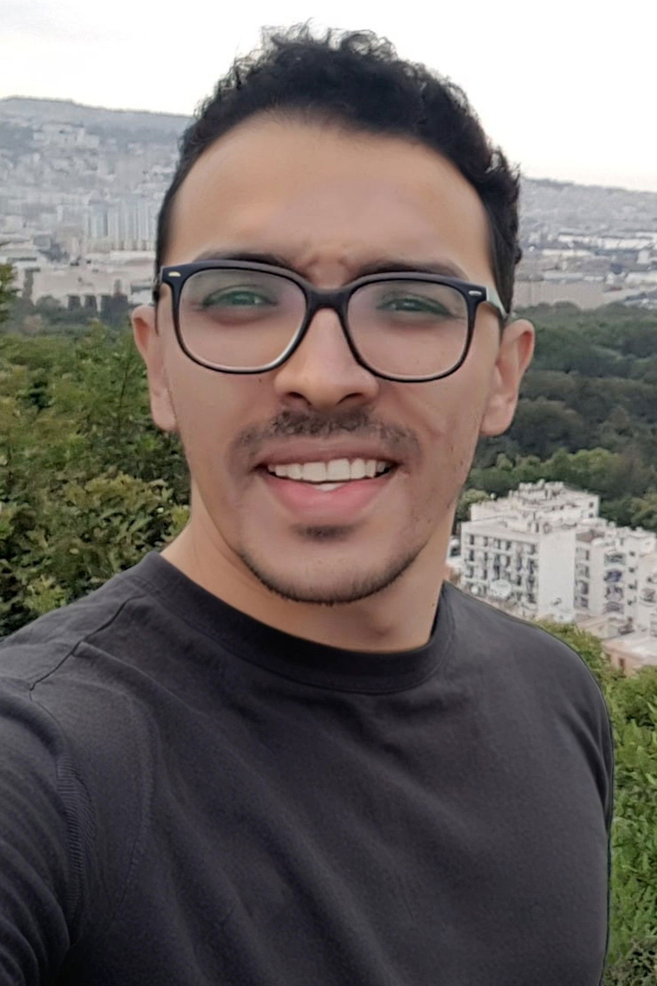 Hamza Mendil backdrop