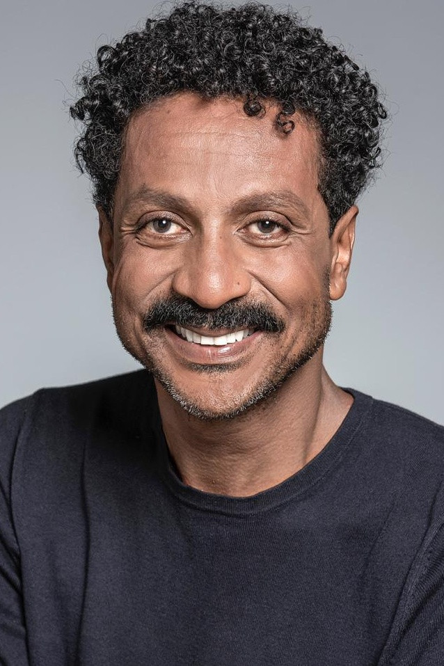 Luis Miranda backdrop