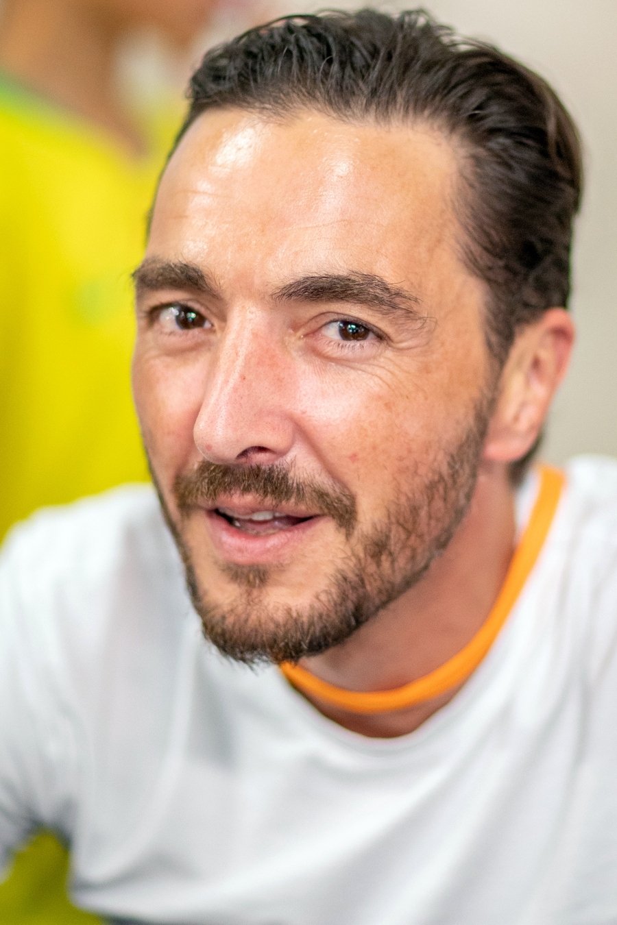 Alexis Tomassian backdrop