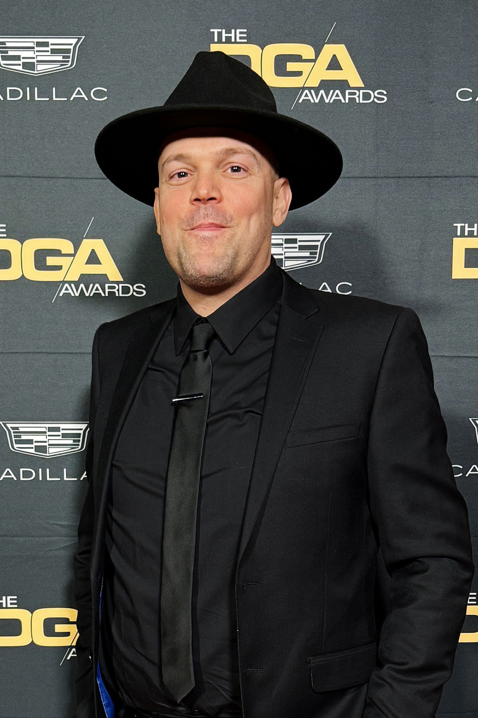 Adrian M. Pruett backdrop