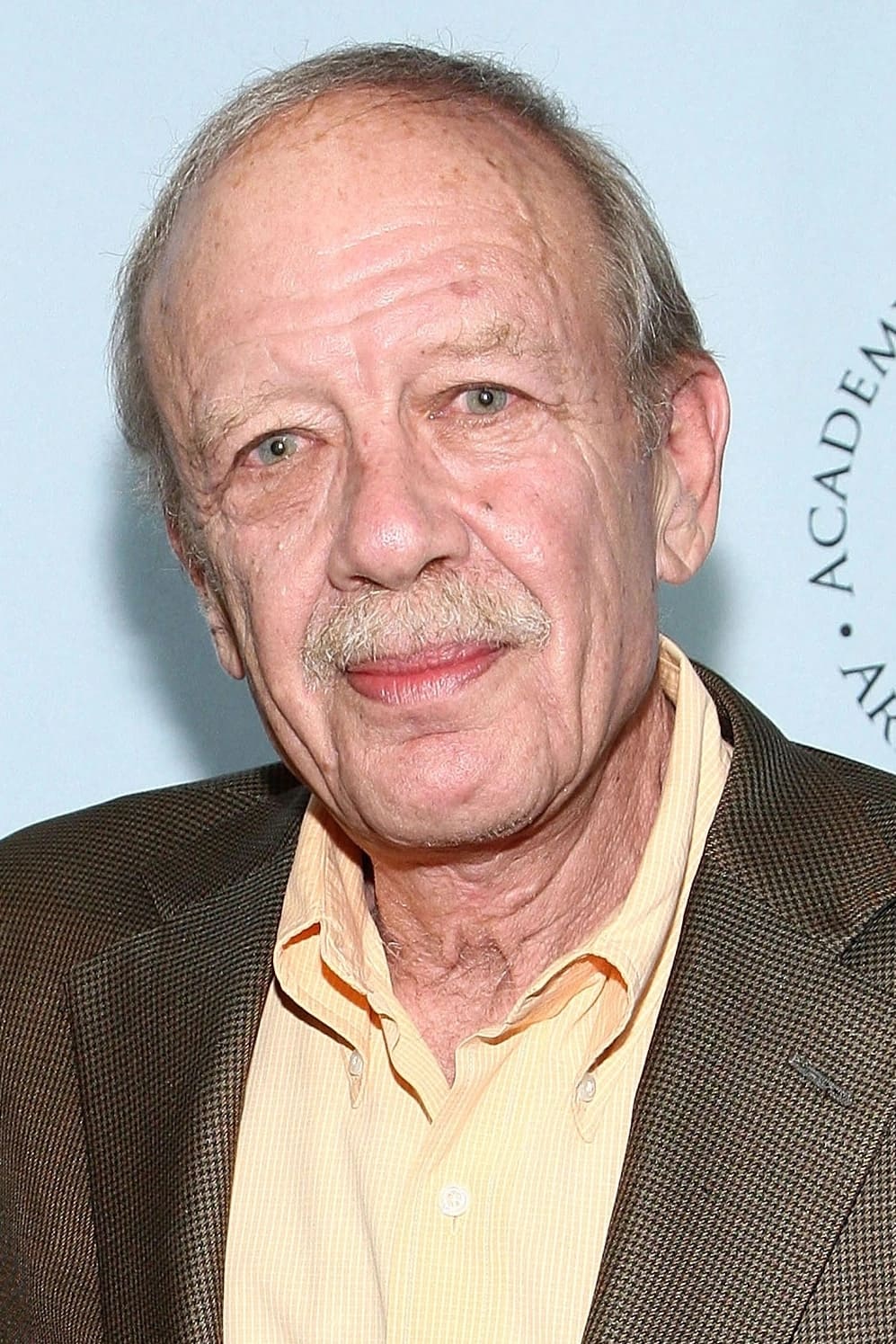 Tom Mankiewicz backdrop