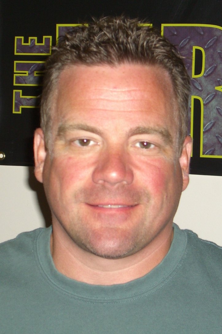 John G. Brennan backdrop