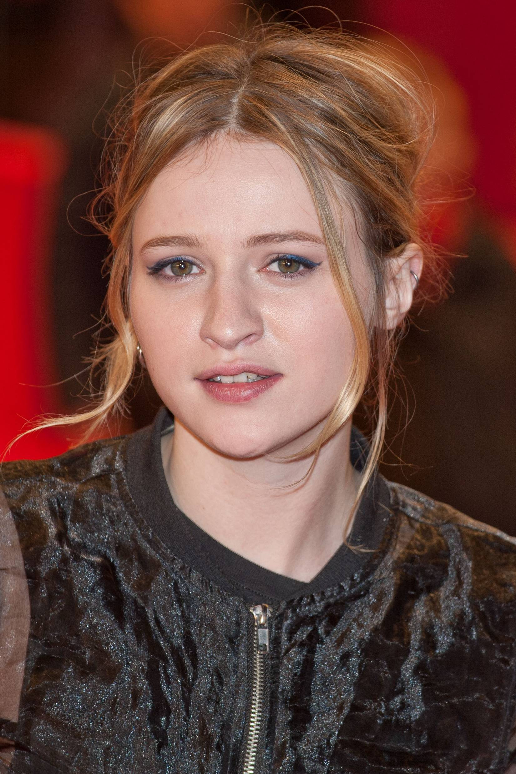 Christa Théret backdrop