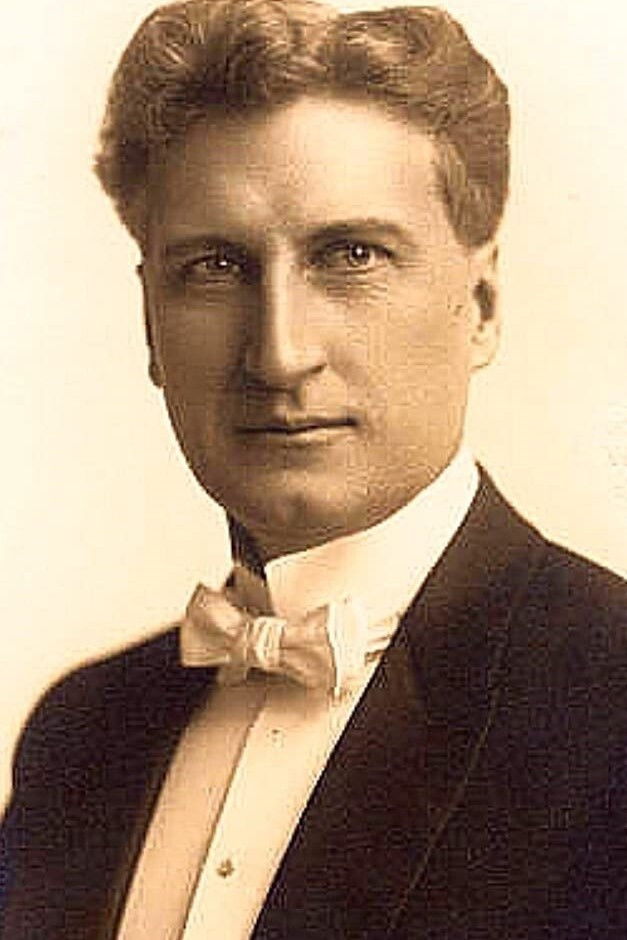 J. Frank Burke backdrop