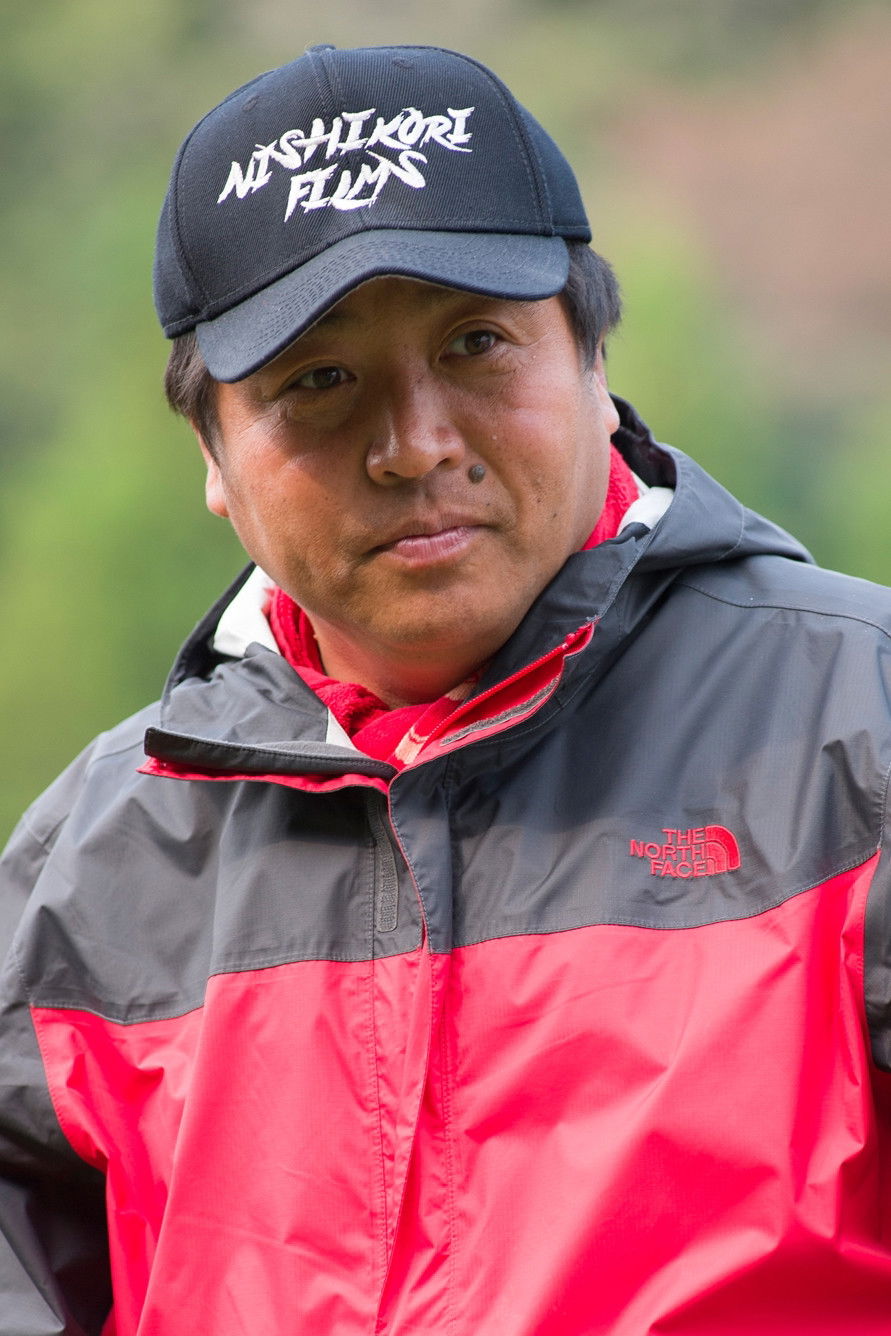 Yoshinari Nishikôri backdrop