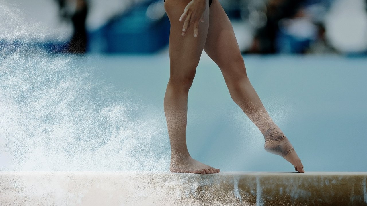 Aurel: Udhëtimi i Gimnastëve Elitë të SHBA-së backdrop