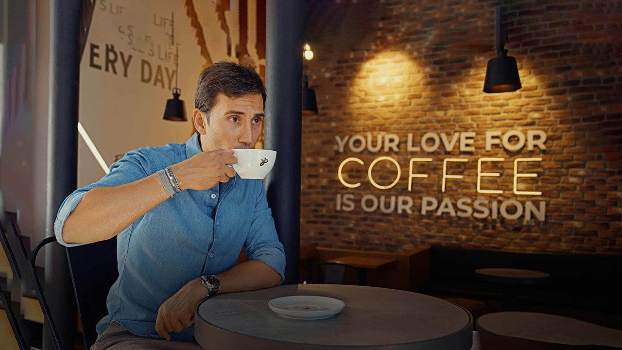 Ne presim në kafenë backdrop