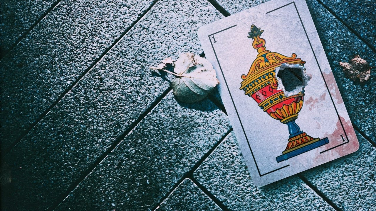 Vrasësi i Kartave të Luajtura backdrop