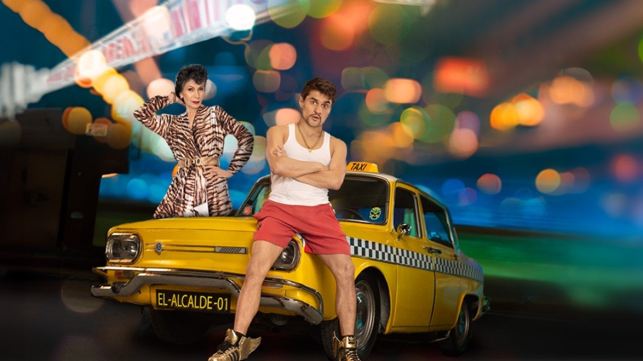 Është e Lirë backdrop