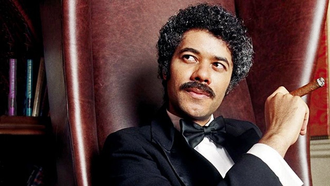 Njeriu me njeri me Dean Learner backdrop