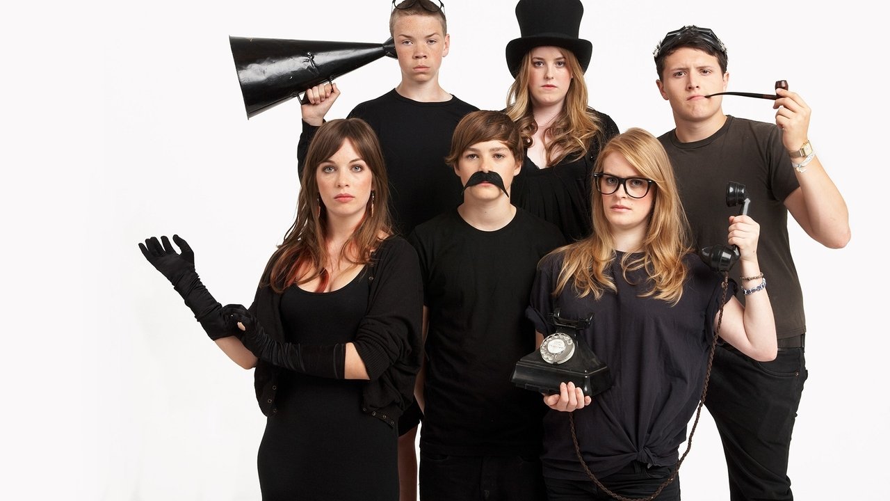 Shkolla e Komedisë backdrop