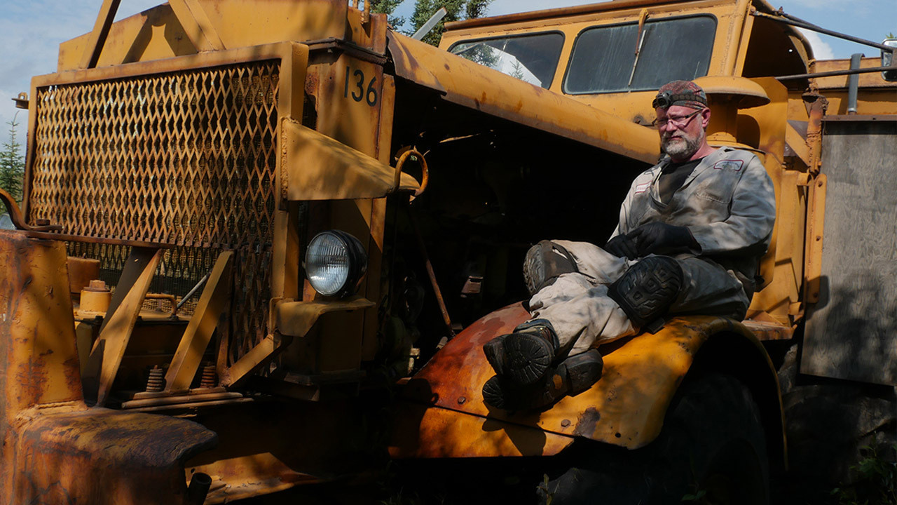 Riparimi i Madh Alaska backdrop